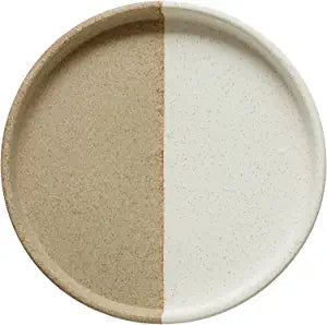 Freshen up your bedroom, hallway, kitchen, or living room by adding this accent tray to the mix, it will effortlessly blend in with any rustic themed setting with its speckled appearance  Round Decorative Two-Tone Stoneware Tray, Cream Color & Beige Speckled Glaze Dimensions: 9-3/4" Round